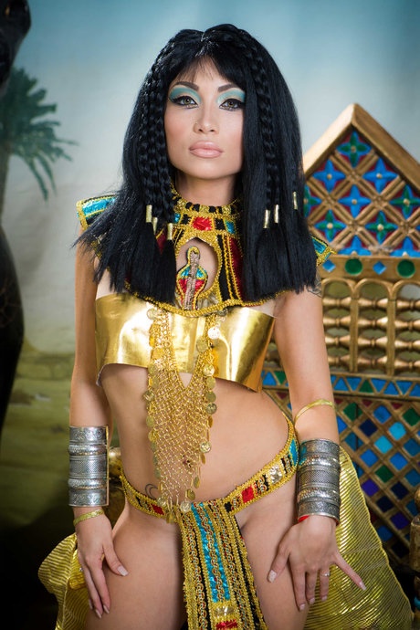 Petite Asian Rina Ellis shows her boobs & ass dressed up as Cleopatra
