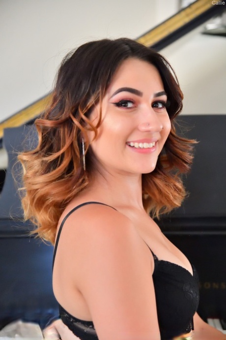 Glamorous babe Callie poses, strips and washes her incredible body