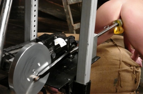 Adorable 31yo Cassidy Essence spreads legs to receive yellow dildo machine