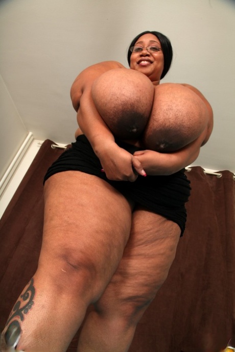 Brunette BBW in black lingerie Cotton Candi exposing her massive saggy tits