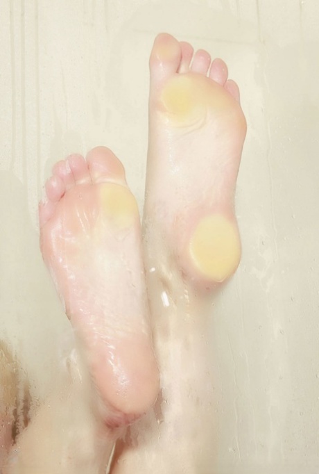 Sexy MILF Kayden Kross exposing her big tits, hot feet and clit in the shower