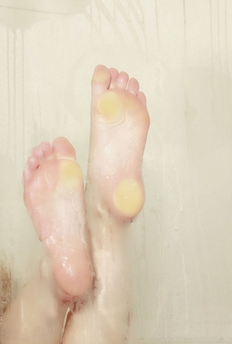 Sexy MILF Kayden Kross exposing her big tits, hot feet and clit in the shower