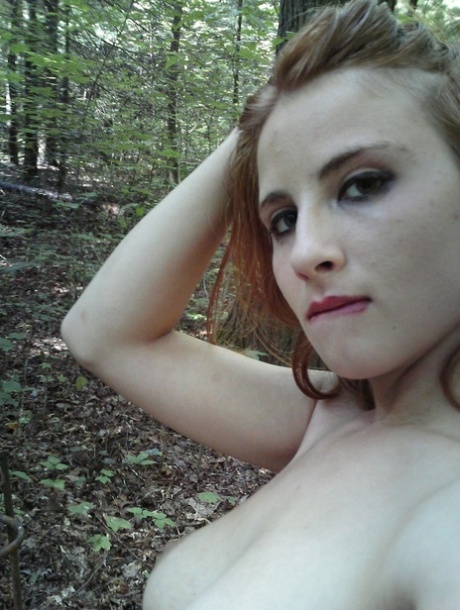 Dirty amateur teen exposes her fantastic breasts and fondles them in the woods