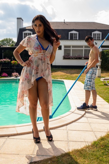 British mom Sahara Knite gets her hairy twat fucked by a pool boy outdoors