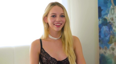Blonde teen in fishnet stockings Lily Larimar gets face fucked by a big cock