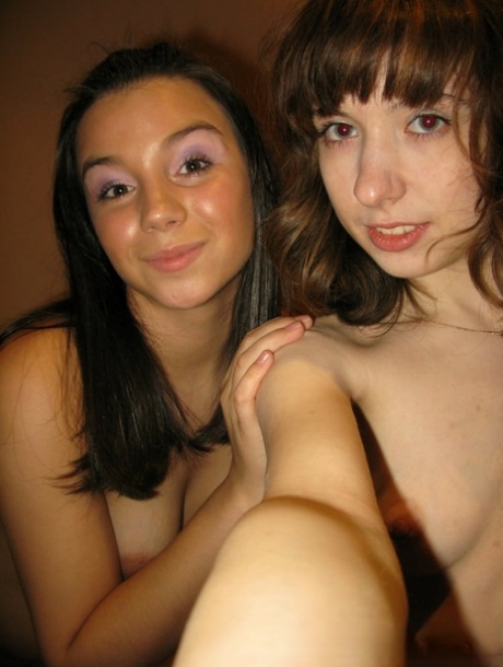 Amateur lesbians shows off their titties while taking nude selfies