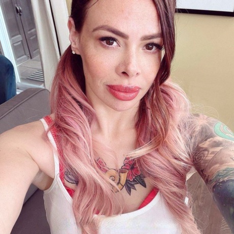 Tattooed schoolgirl Lili Cocksinhell flirts with her teacher before stripping