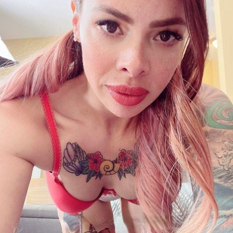 Tattooed schoolgirl Lili Cocksinhell flirts with her teacher before stripping