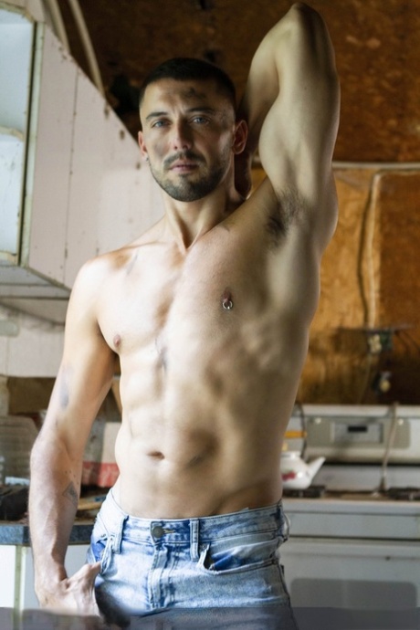Hung gay Ryan Bones wanks while having wild anal sex with a muscular top