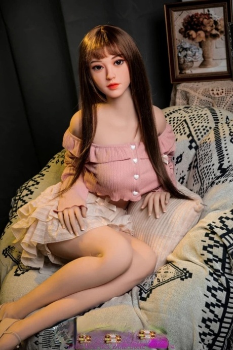 Beautiful lifelike sex doll shows her big boobs & her sweet pink pussy