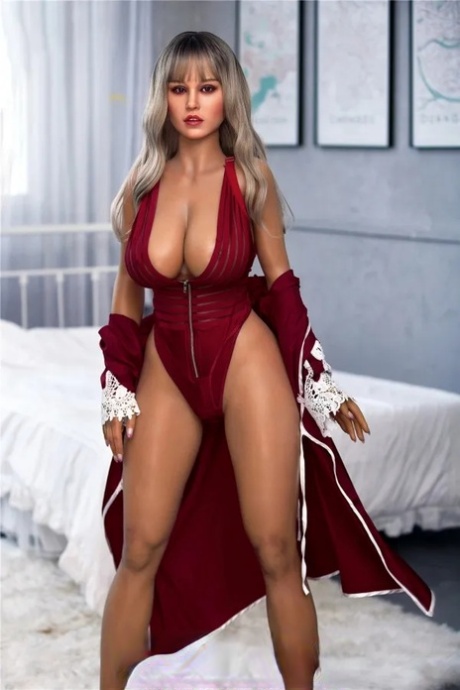 Attractive sex doll Opal poses seductively and unveils her big tits