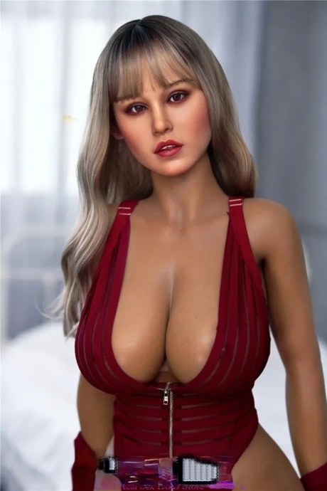 Attractive sex doll Opal poses seductively and unveils her big tits