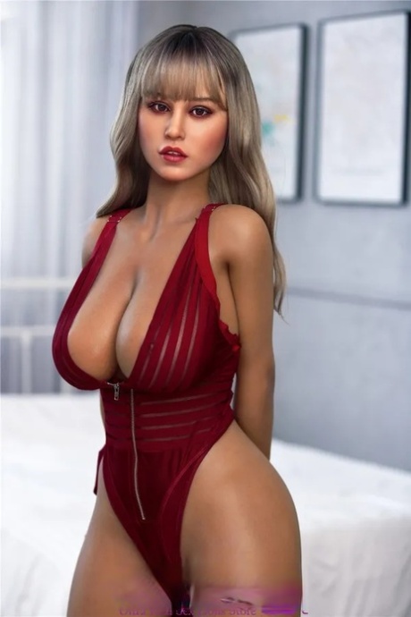 Attractive sex doll Opal poses seductively and unveils her big tits