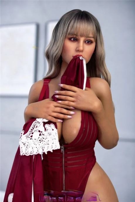 Attractive sex doll Opal poses seductively and unveils her big tits