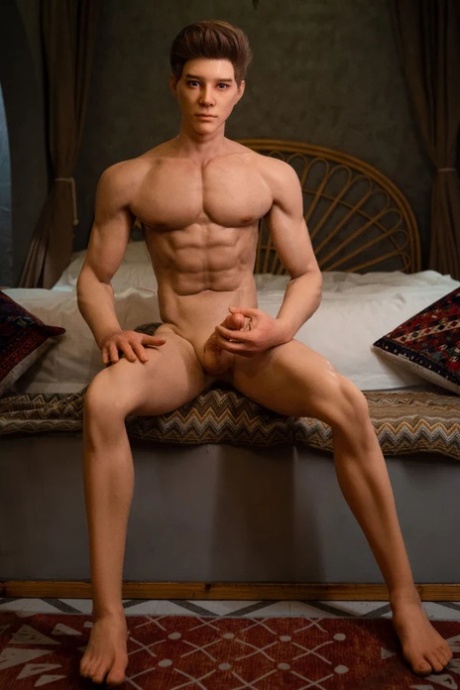 Handsome male sex doll Ronin unveils his six pack and masturbates