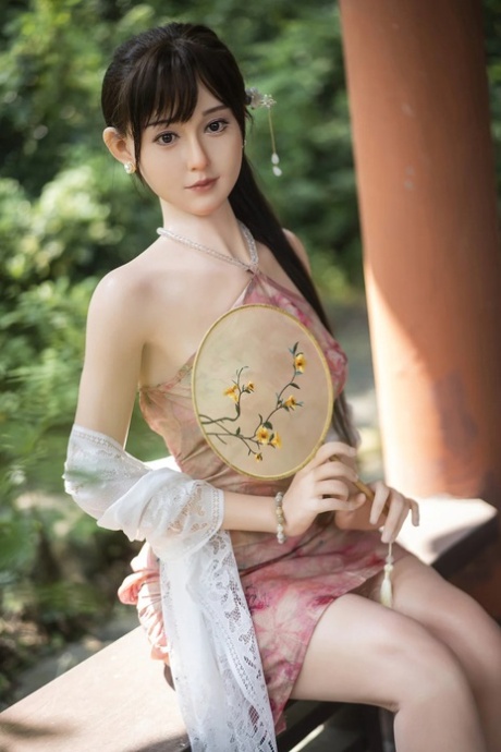 Petite Japanese sex doll Miho posing butt naked and in her traditional outfit