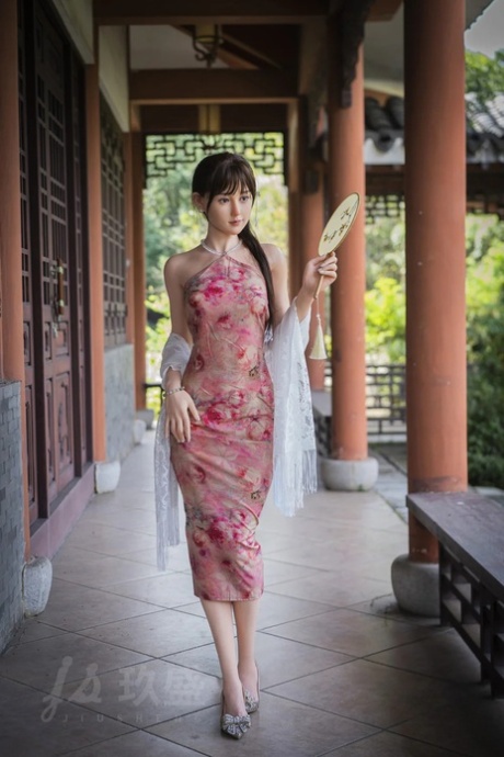 Petite Japanese sex doll Miho posing butt naked and in her traditional outfit