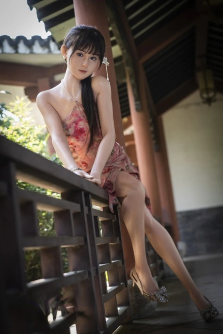 Petite Japanese sex doll Miho posing butt naked and in her traditional outfit