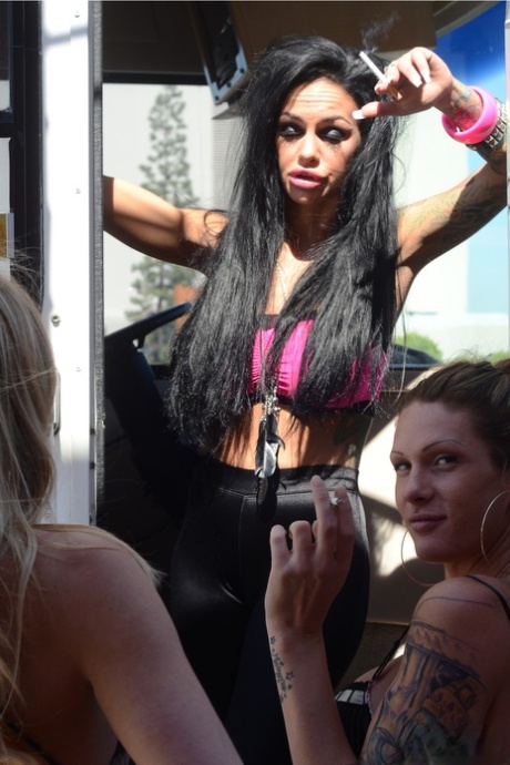 Busty pornstar Angelina Valentine and her friends strip and pose in a van - pornpics.de