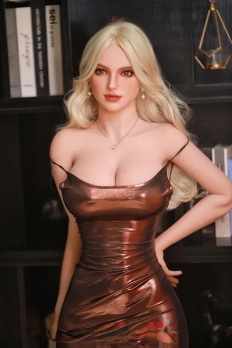 Glamorous sex doll Maybritt strips her shiny dress & poses in her panties