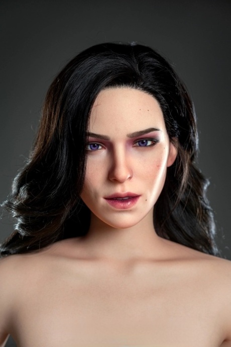 Raven-haired silicone sex doll Yennefer poses naked & in her black outfit