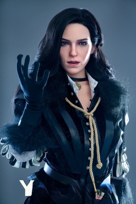 Raven-haired silicone sex doll Yennefer poses naked & in her black outfit