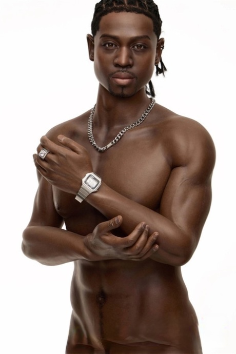 Good-looking black male sex doll shows his athletic body while shirtless