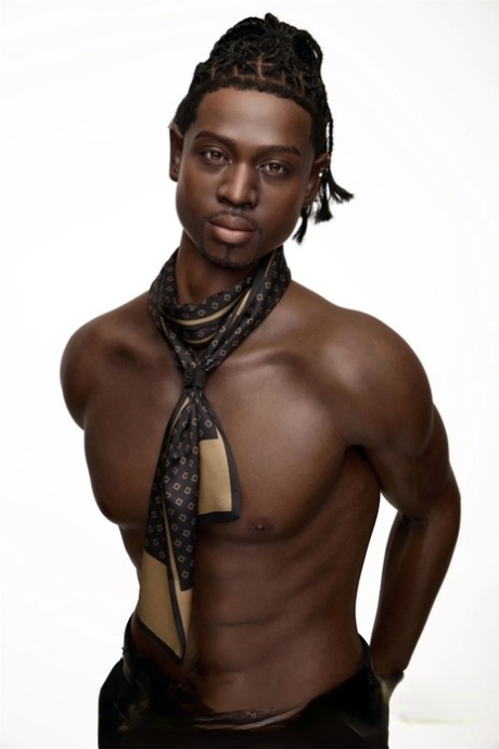 Good-looking black male sex doll shows his athletic body while shirtless