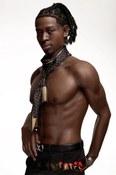 Good-looking black male sex doll shows his athletic body while shirtless