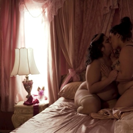 Two horny fat lesbians lick each other