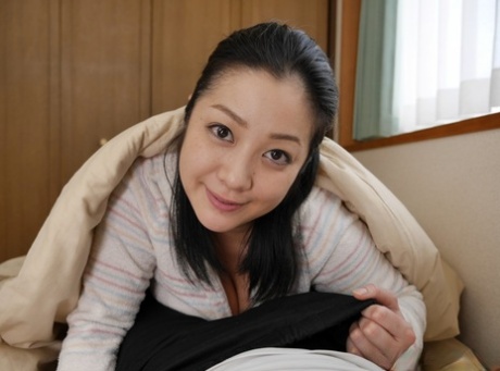 Hot Japanese wife Minako Komuki giving a blowjob and titjob in POV