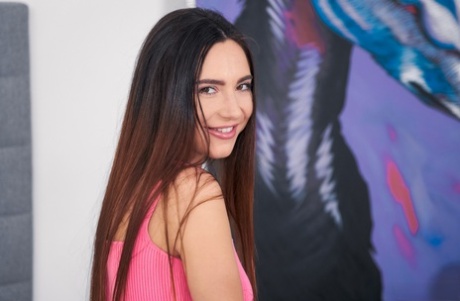 Raven-haired teen Sakura Hell undresses and gently fingers her beaver