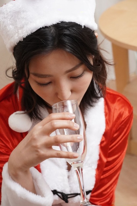 Japanese Mrs Santa Claus Emiri Momota fucks and tastes fresh cum