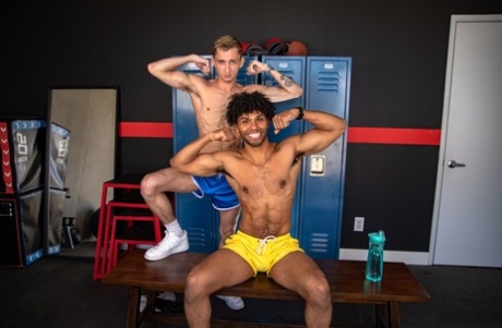 Hung gay Theo Brady enjoys hardcore anal sex with a black bottom at the gym