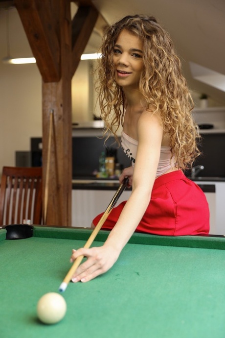Curly haired teen Sabrina Spice gets banged on a chair by the billiard table