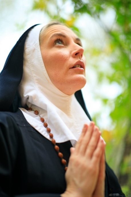 Lesbian nun Mona Wales flaunts her big ass outdoors after oral sex with her GF