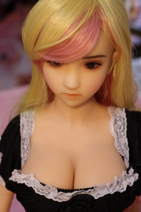 Busty petite sex doll shows her big boobs wearing black lingerie & while naked