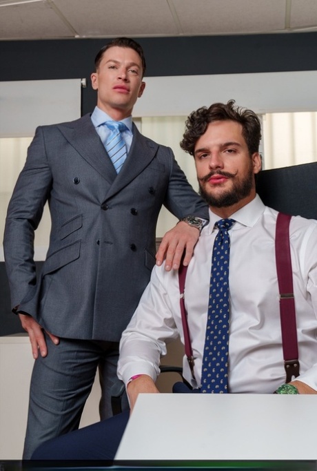 Gay colleagues Ruslan Angelo & Samuel Hodecker have hardcore anal sex at work