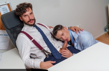 Gay colleagues Ruslan Angelo & Samuel Hodecker have hardcore anal sex at work