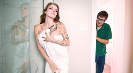 Tattooed pornstar Eden Ivy getting fucked doggystyle by a perverted nerd