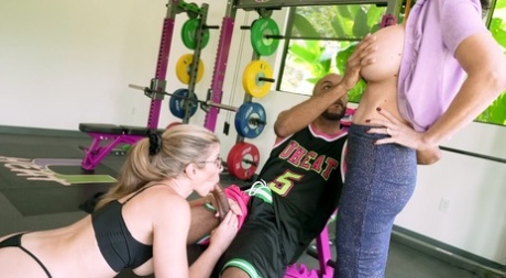 Blonde mom Cory Chase enjoys a BBC in a wild threesome at the gym