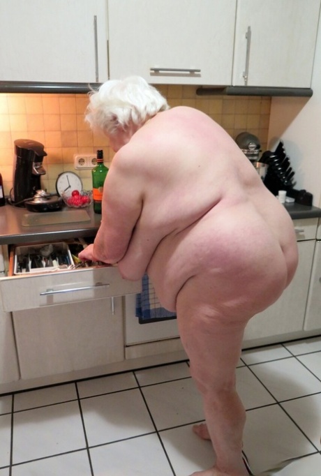 Naughty granny Neebana shows her chubby body while completely naked