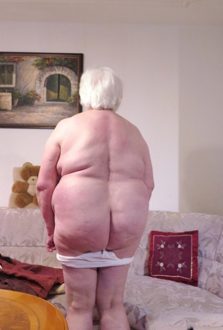 Naughty granny Neebana shows her chubby body while completely naked