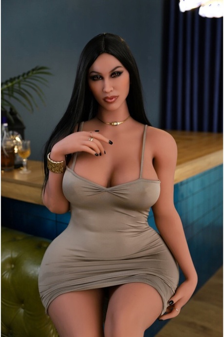 Curvaceous sex doll models in the nude and while wearing a clingy dress too