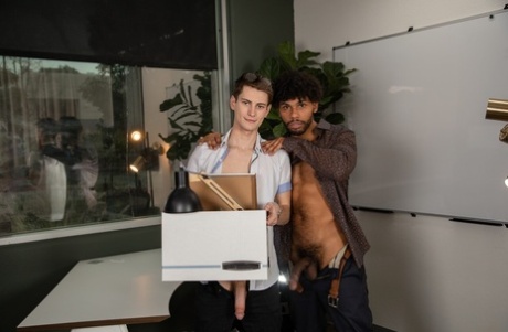 Trevor Harris and Tony Genius have interracial gay sex in an office