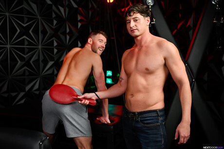 Gay hunks Taylor Reign and Justin DaJock have doggystyle anal sex