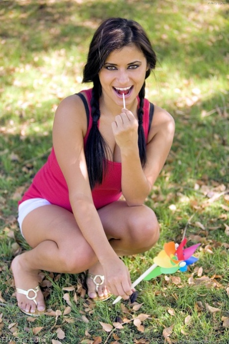Playful Spanish MILF Alexa Loren reveals her huge natural tits in public