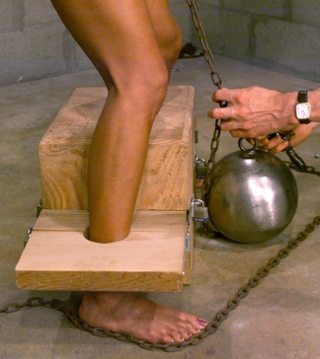 Gagged Asian Kelana gets her tits whipped while restrained in a ball & chain