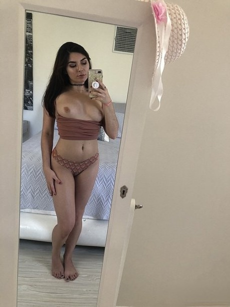 Petite brunette Keira Croft strips her lingerie to reveal her breathtaking ass - pornpics.de