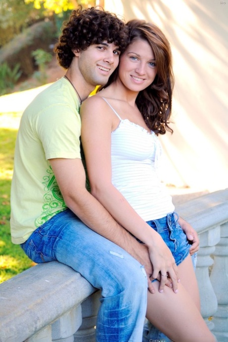 Beautiful amateur Gabby hikes her denim skirt up and poses with her boyfriend